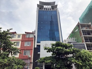 Mặt trước toàn cảnh oà cao ốc văn phòng cho thuê Melody Tower, đường Ung Văn Khiêm, quận Bình Thạnh, TP.HCM - vlook.vn