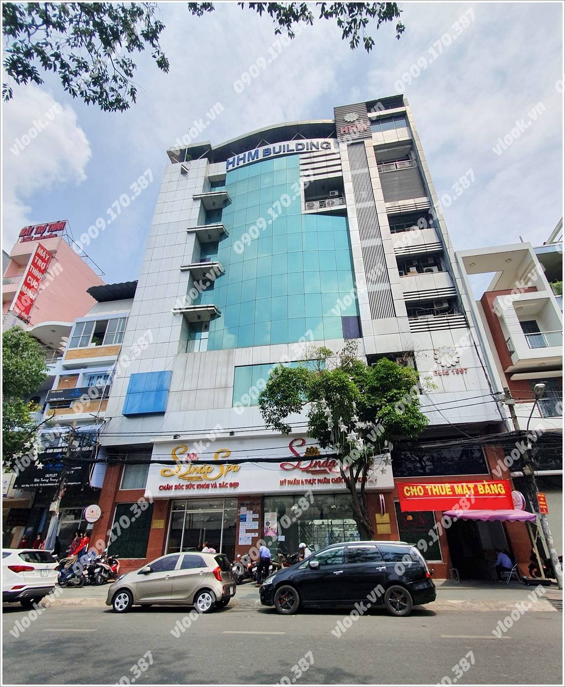 Mặt trước toàn cảnh oà cao ốc văn phòng cho thuê HHM Building, đường Xuân Hồng, quận Tân Bình, TP.HCM - vlook.vn